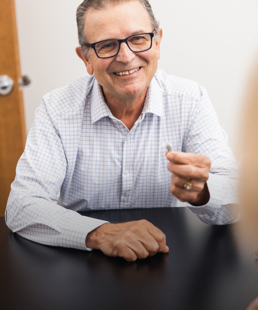 Hearing specialist model with glasses